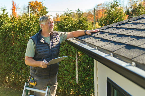 Professional Roof Repair technician working in Caruthers, CA
